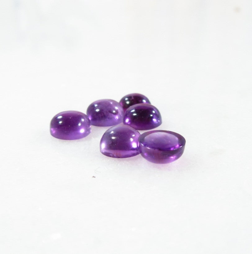 round amethyst gemstone smooth