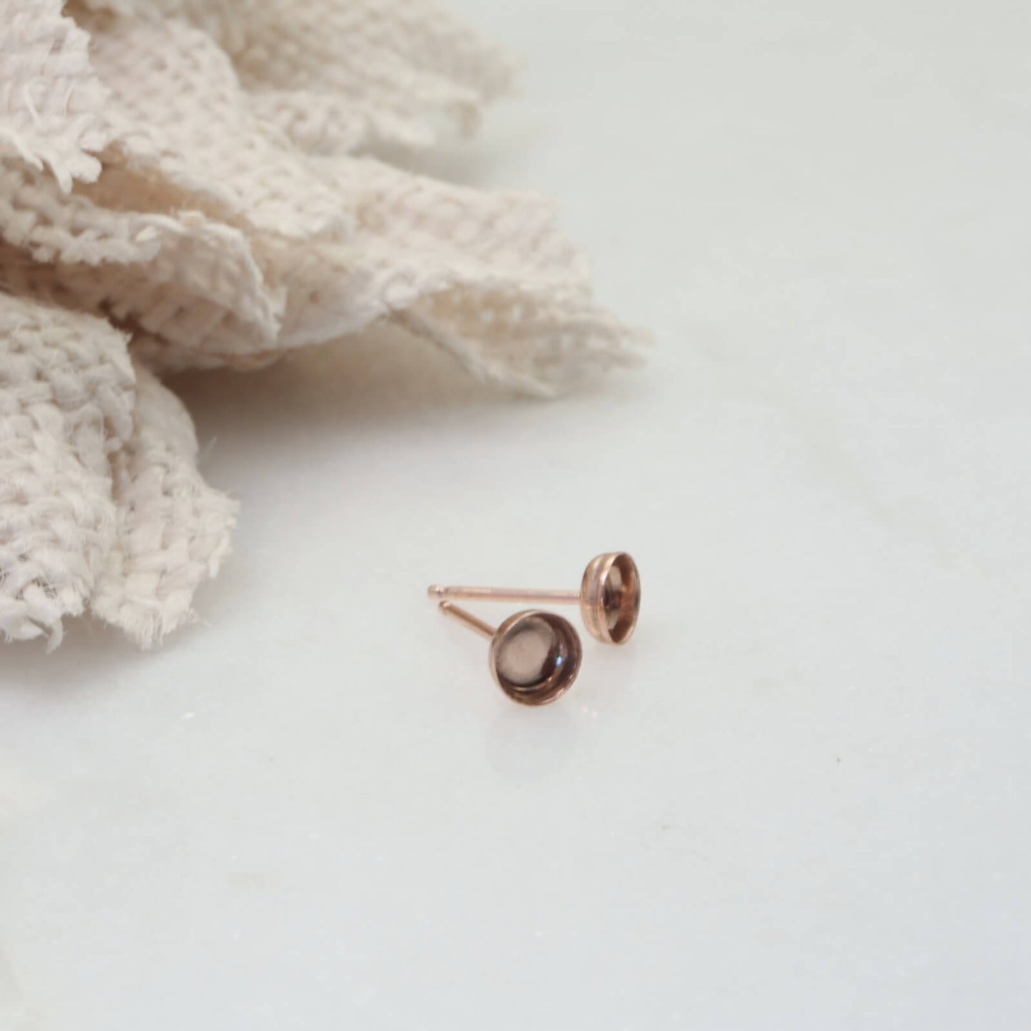 pink gold round bezel cup stud settings