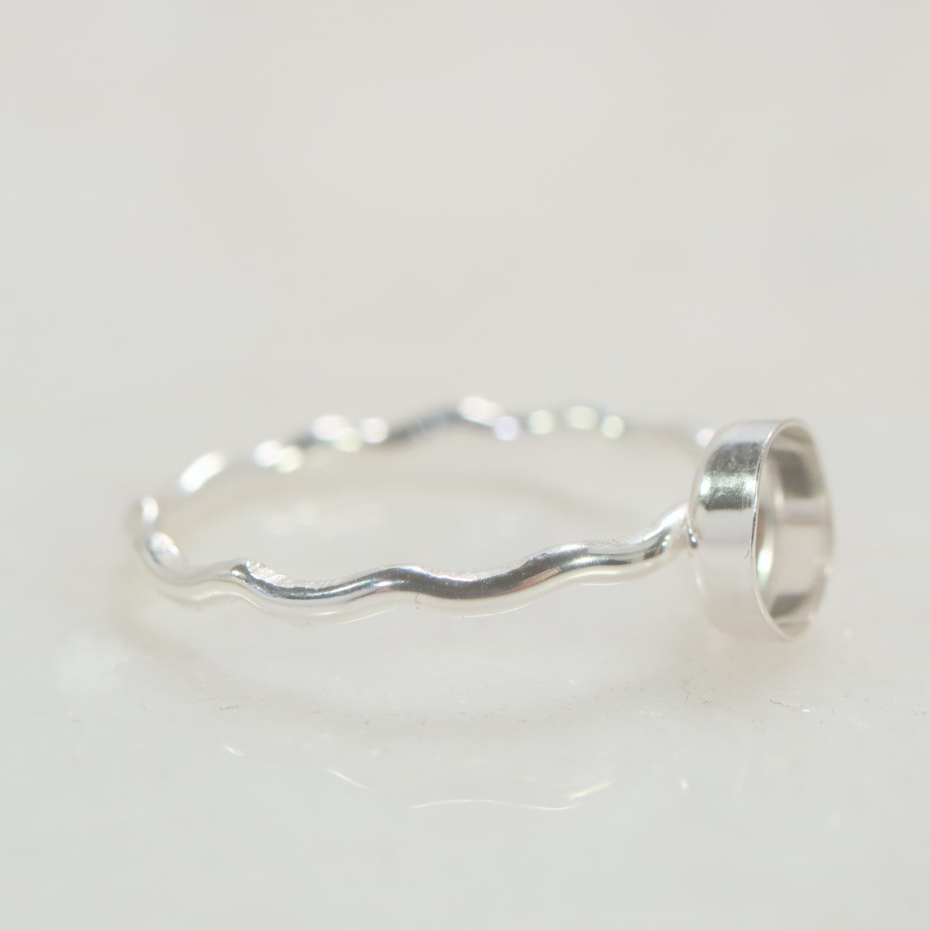 alternating bezel cup ring setting